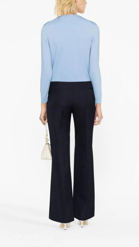 Strickjacke aus Wolle mit Kleeblatt-Verzierung in Blau 