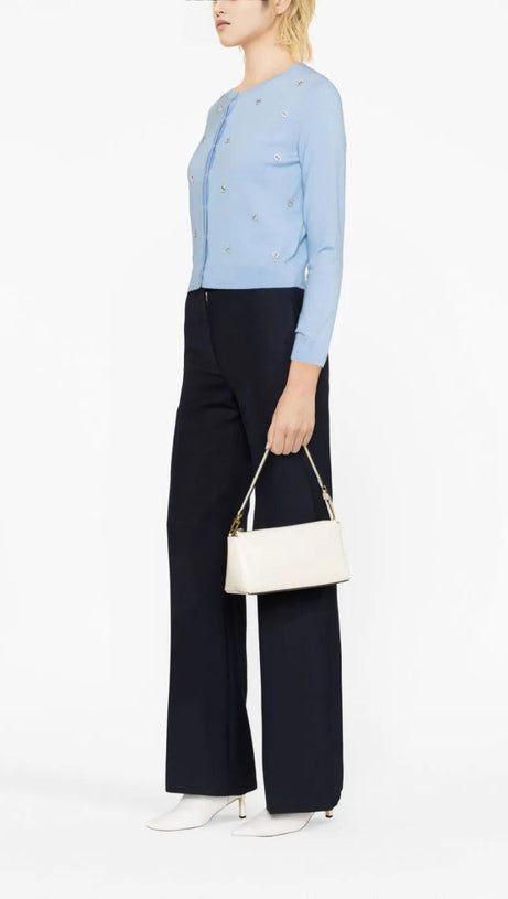 Strickjacke aus Wolle mit Kleeblatt-Verzierung in Blau 