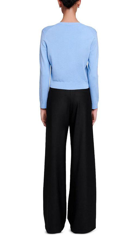 Strickjacke aus Wolle mit Kleeblatt-Verzierung in Blau 