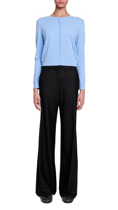 Strickjacke aus Wolle mit Kleeblatt-Verzierung in Blau 