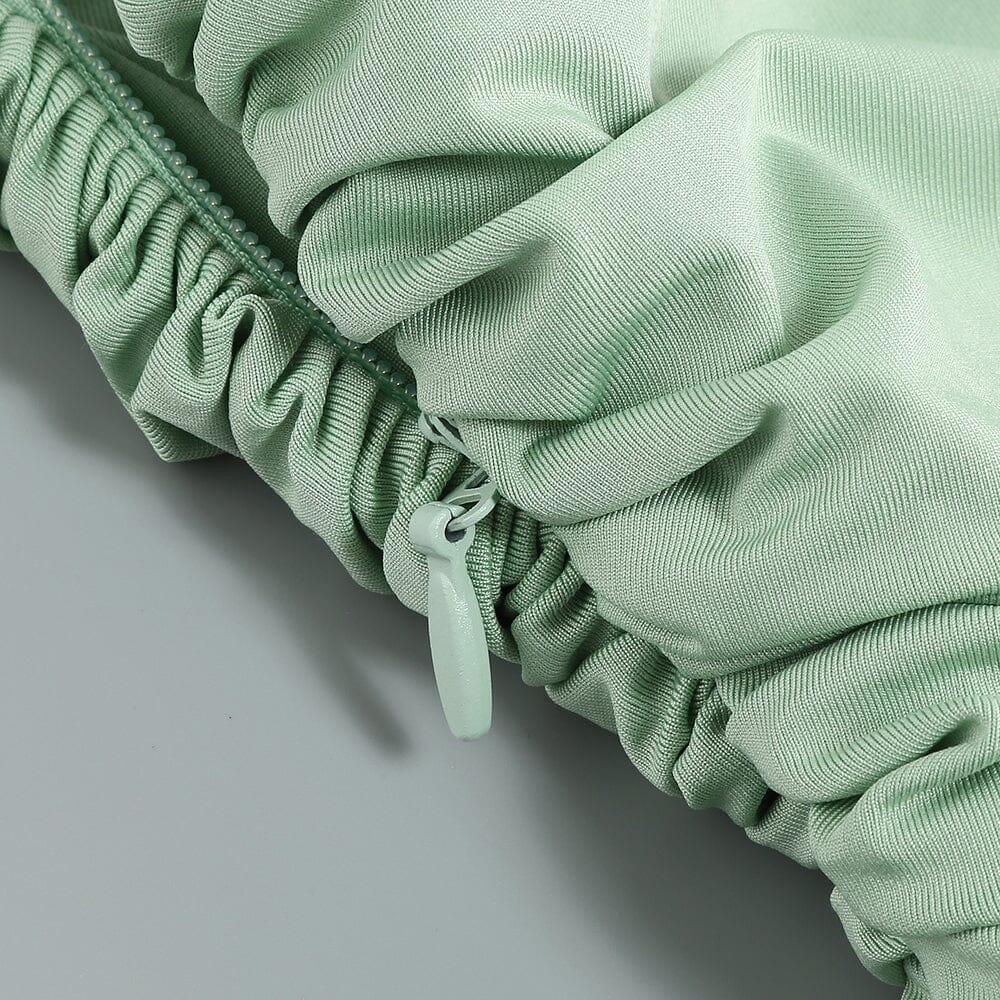 PLISSIERTES ÄRMELLOSES ONE-SHOULDER-KLEID IN GRÜN