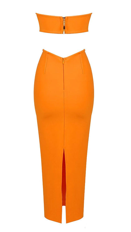 BUSTIER NECKLINE CUT OUT BANDAGE DRESS IN ORANGE