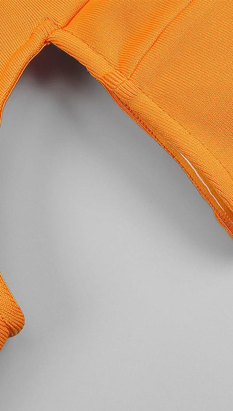 BUSTIER NECKLINE CUT OUT BANDAGE DRESS IN ORANGE