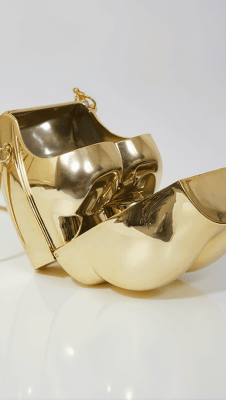 MORWENNA ACRYLIC BUTT BAG IN GOLD