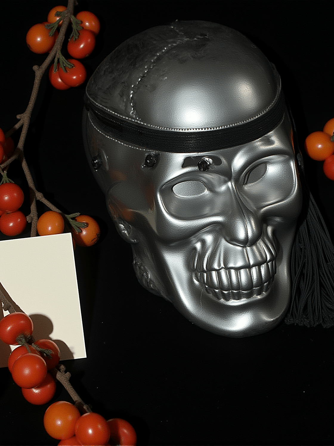 ALARIC SILVER SKULL CLUTCH