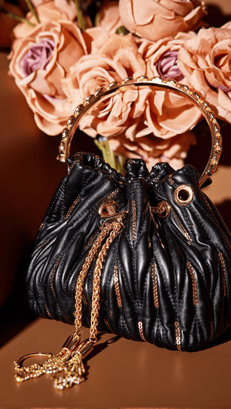MATTEA LEATHER SEQUIN BUCKET BAG IN BLACK
