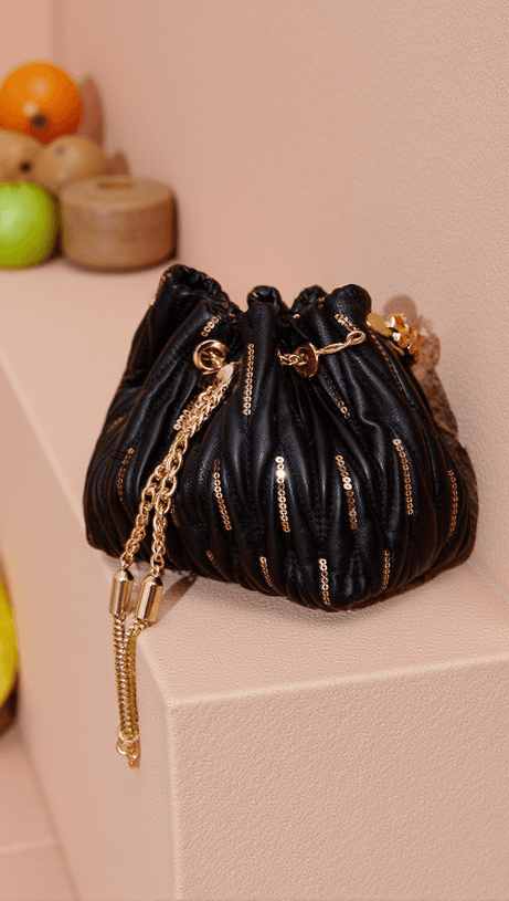 MATTEA LEATHER SEQUIN BUCKET BAG IN BLACK