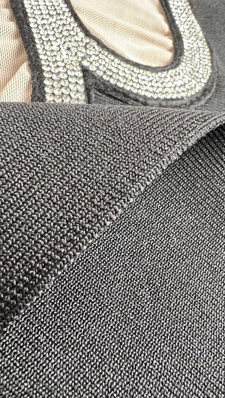 TOP CANOTTIERA CON DISEGNO BENDAGGIO TAGLIO LUCIDO E DIAMANTI IN NERO