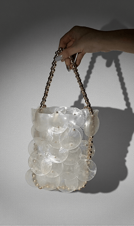 Kuro Circle Shell Clutch mit Metallkette