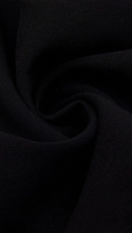 MESH STITCHED CROSS-TIE JUMPSUIT IN BLACK