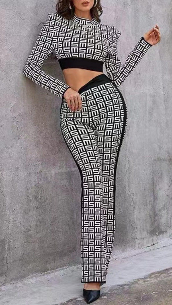 AIIZIE MONOGRAM PRINTED SHOULDER PAD SUIT IN WHITE AND BLACK - product image