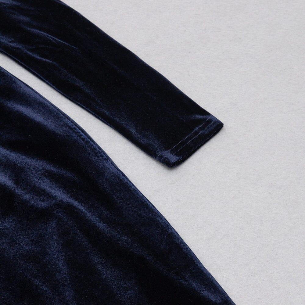 AUSGEHÖHLTES SAMTKLEID MIT V-AUSSCHNITT IN DUNKELBLAU