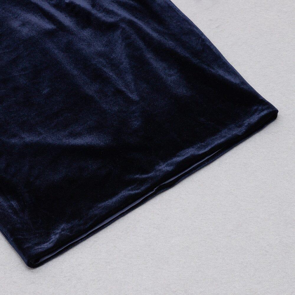 AUSGEHÖHLTES SAMTKLEID MIT V-AUSSCHNITT IN DUNKELBLAU