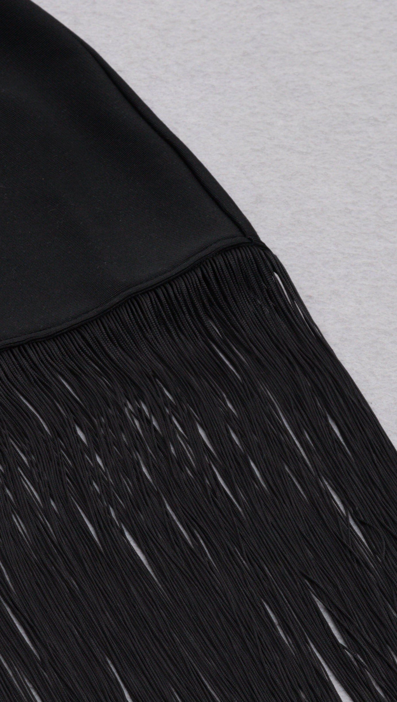 SLEEVELESS HOLLOWED OUT FRINGE DRESS IN BLACK