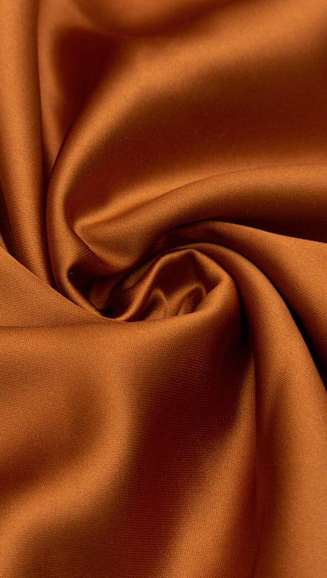 IRREGULAR RUFFLED BUTTOCK WRAP DRESS IN CARAMEL