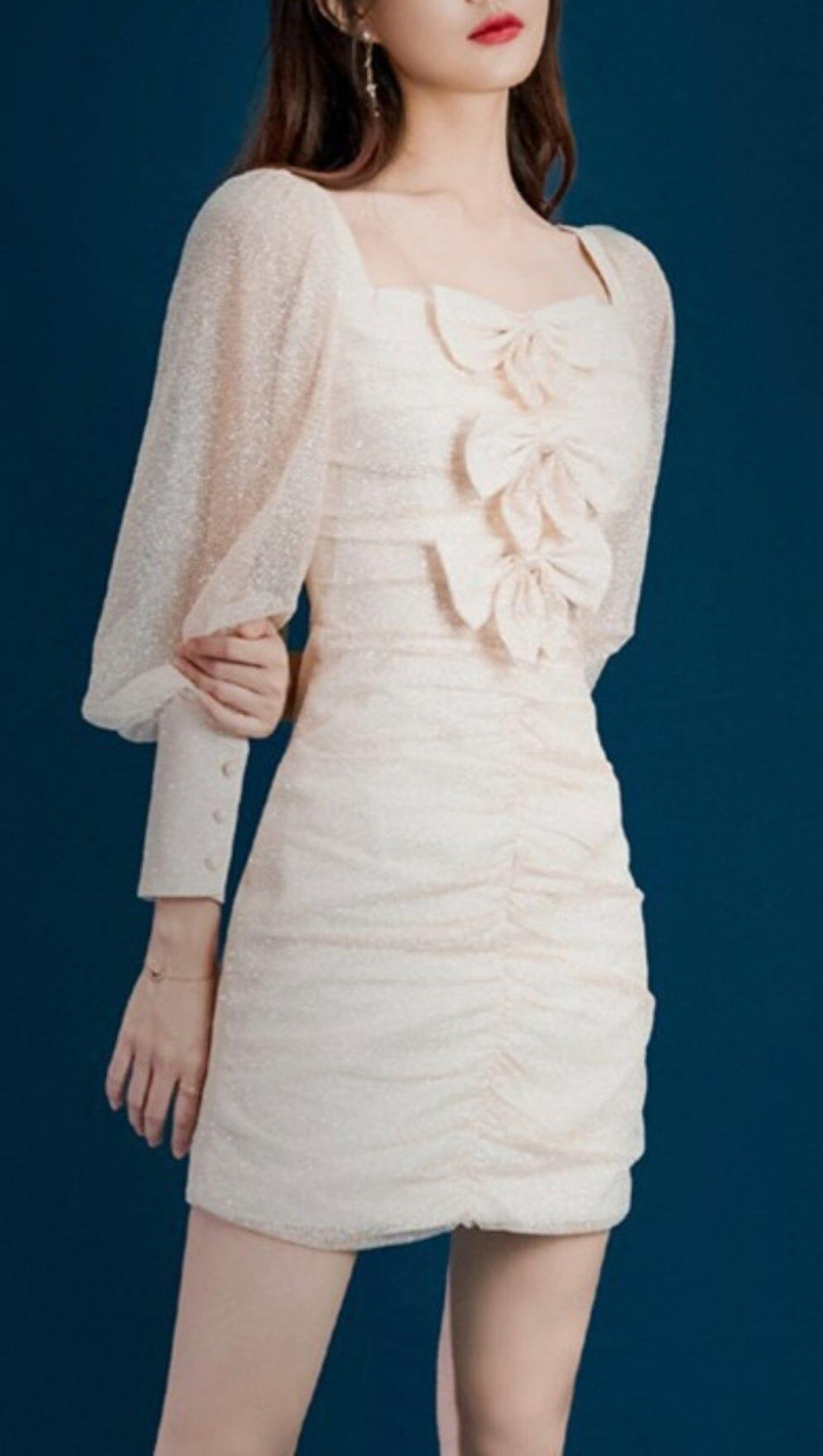 BOW STREAMER MESH PLEATED DRESS IN BEIGE