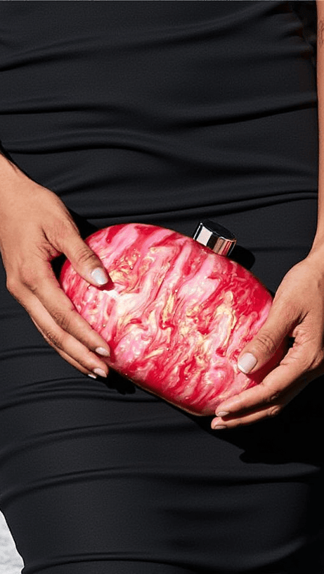 LONEA PEARLESCENT ACRYLIC CLUTCH IN PINK