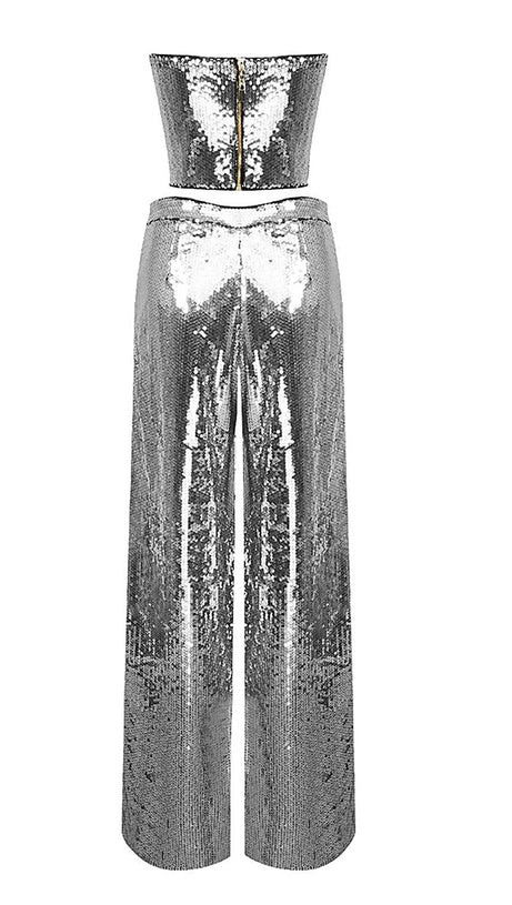COMPLETO DUE PEZZI CON TOP E PANTALONI IN PAILLETTES ARGENTO SENZA SPALLINE