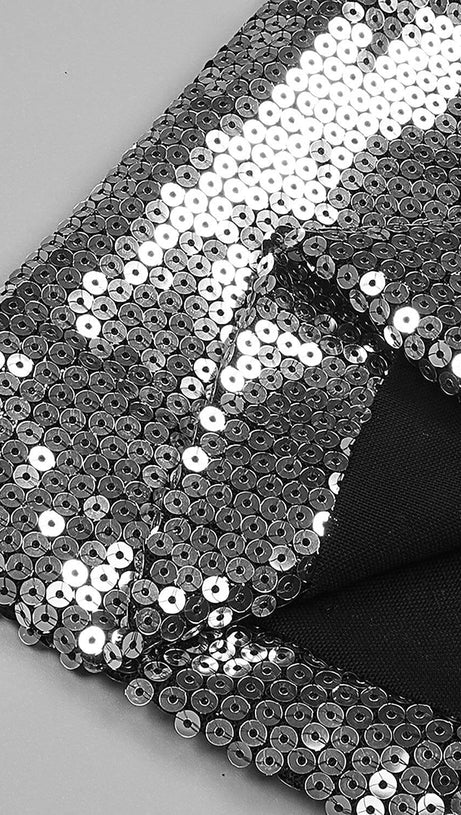 COMPLETO DUE PEZZI CON TOP E PANTALONI IN PAILLETTES ARGENTO SENZA SPALLINE