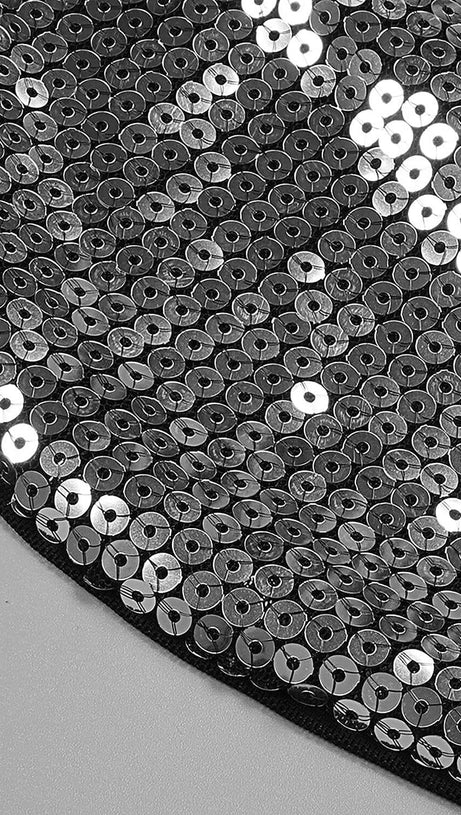 COMPLETO DUE PEZZI CON TOP E PANTALONI IN PAILLETTES ARGENTO SENZA SPALLINE