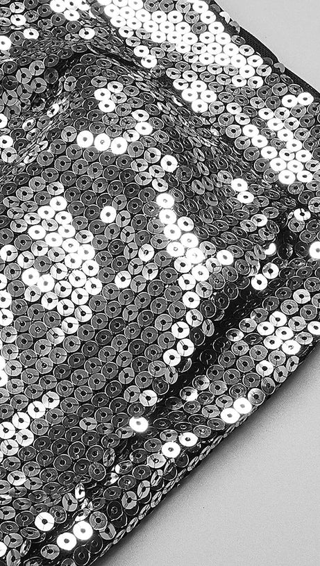 COMPLETO DUE PEZZI CON TOP E PANTALONI IN PAILLETTES ARGENTO SENZA SPALLINE