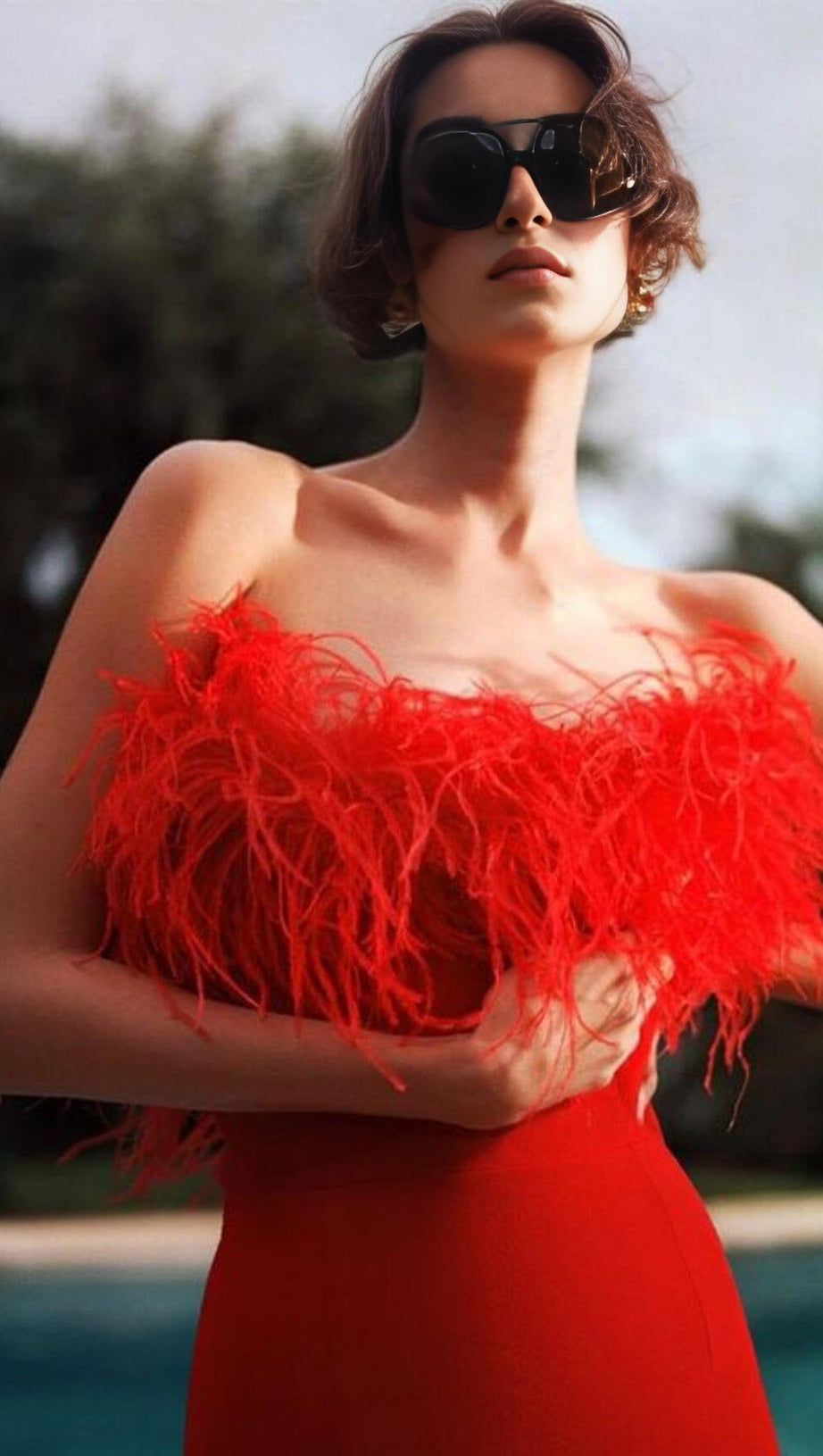 STRETCH STRAPLESS FEATHER TRIMMED GOWN IN RED