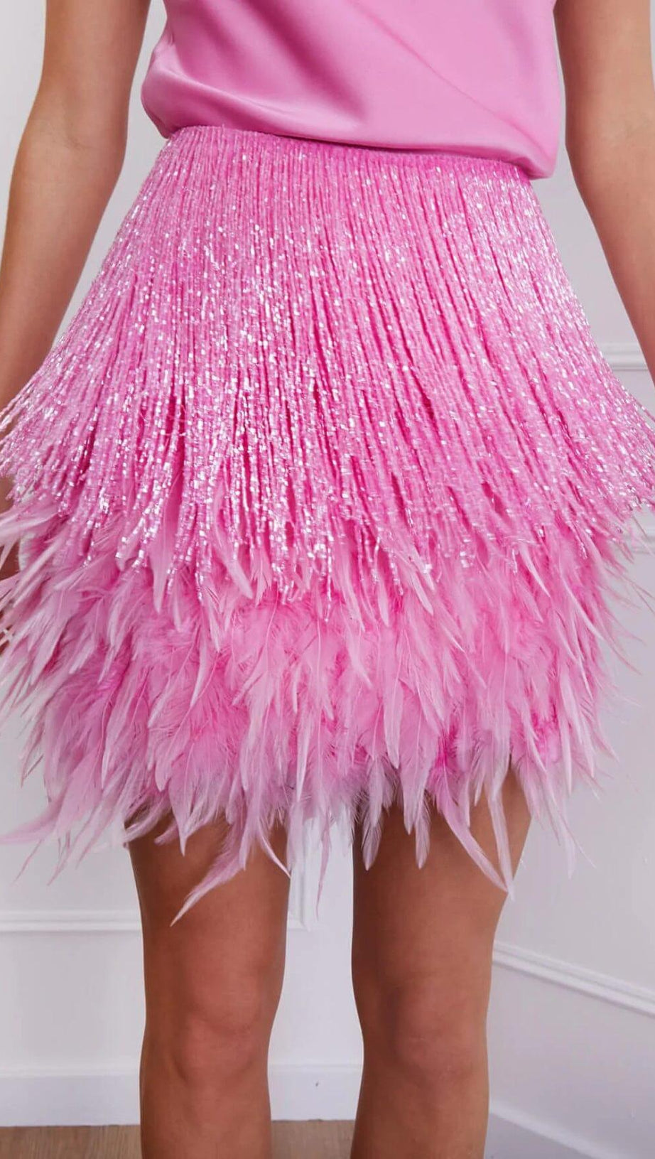 MINI ABITO CON PIUME E FRANGE LUCIDE ROSA