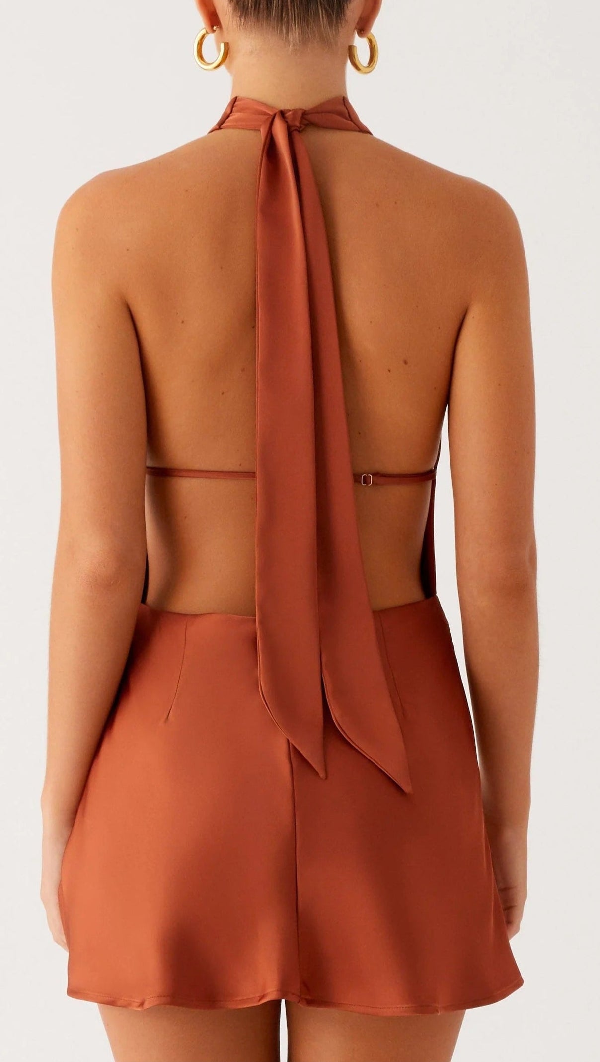 AIIZIE HALTER BACKLESS SATIN MINI DRESS IN RUST - product image