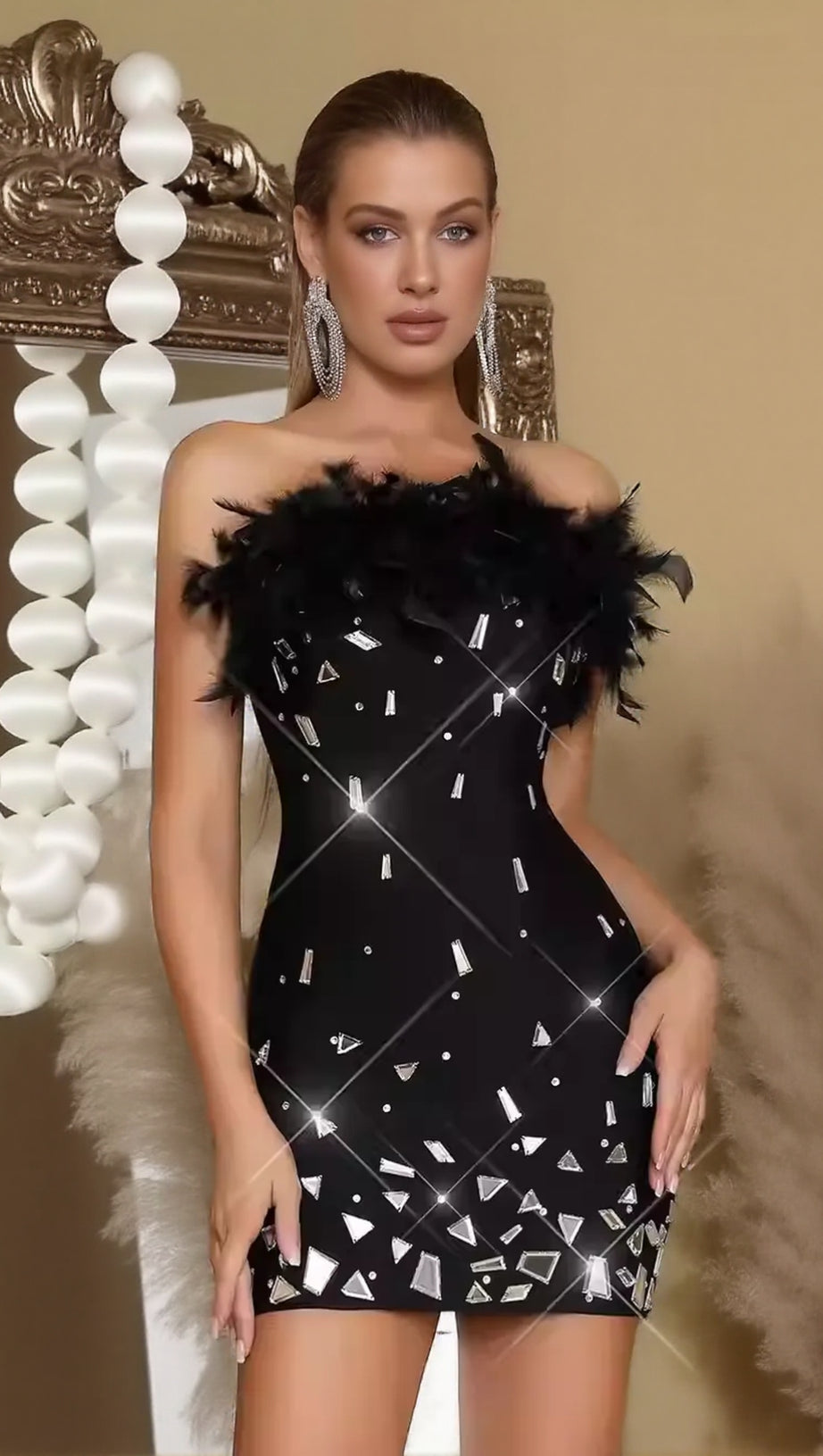 SEQUIN STRAPLESS FEATHER MINI DRESS IN BLACK
