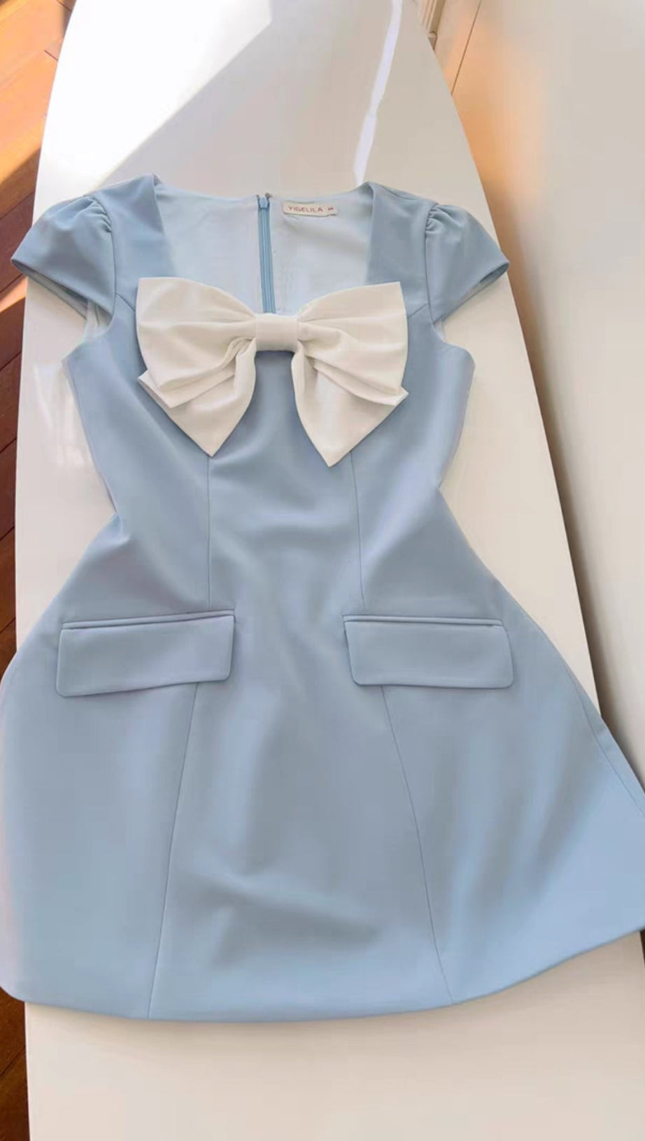 BOW SHORT SLEEVE MINI DRESS IN BLUE