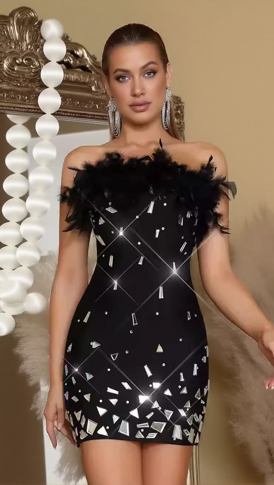 SEQUIN STRAPLESS FEATHER MINI DRESS IN BLACK