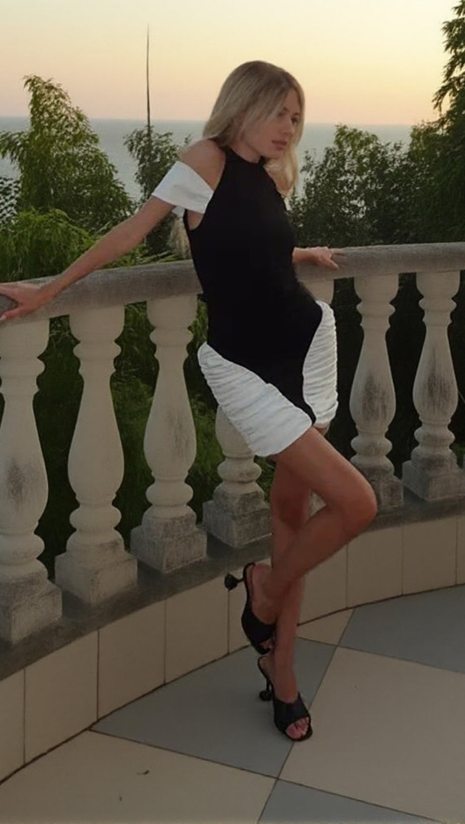 BLACK-WHITE PANEL SLEEVELESS GATHERED HALTER MINI DRESS