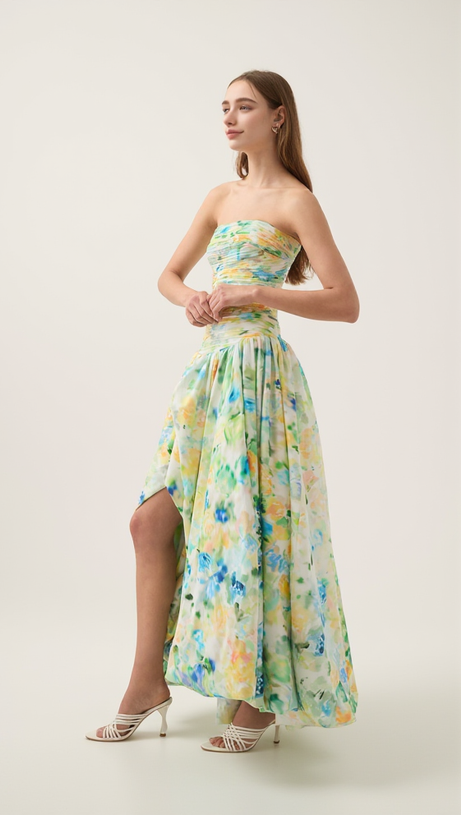 Nancy Violette – Maxikleid mit Ballonsaum in Grün