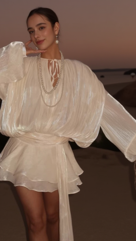 Aprikosenfarbenes, langärmliges Minikleid mit Schleife 