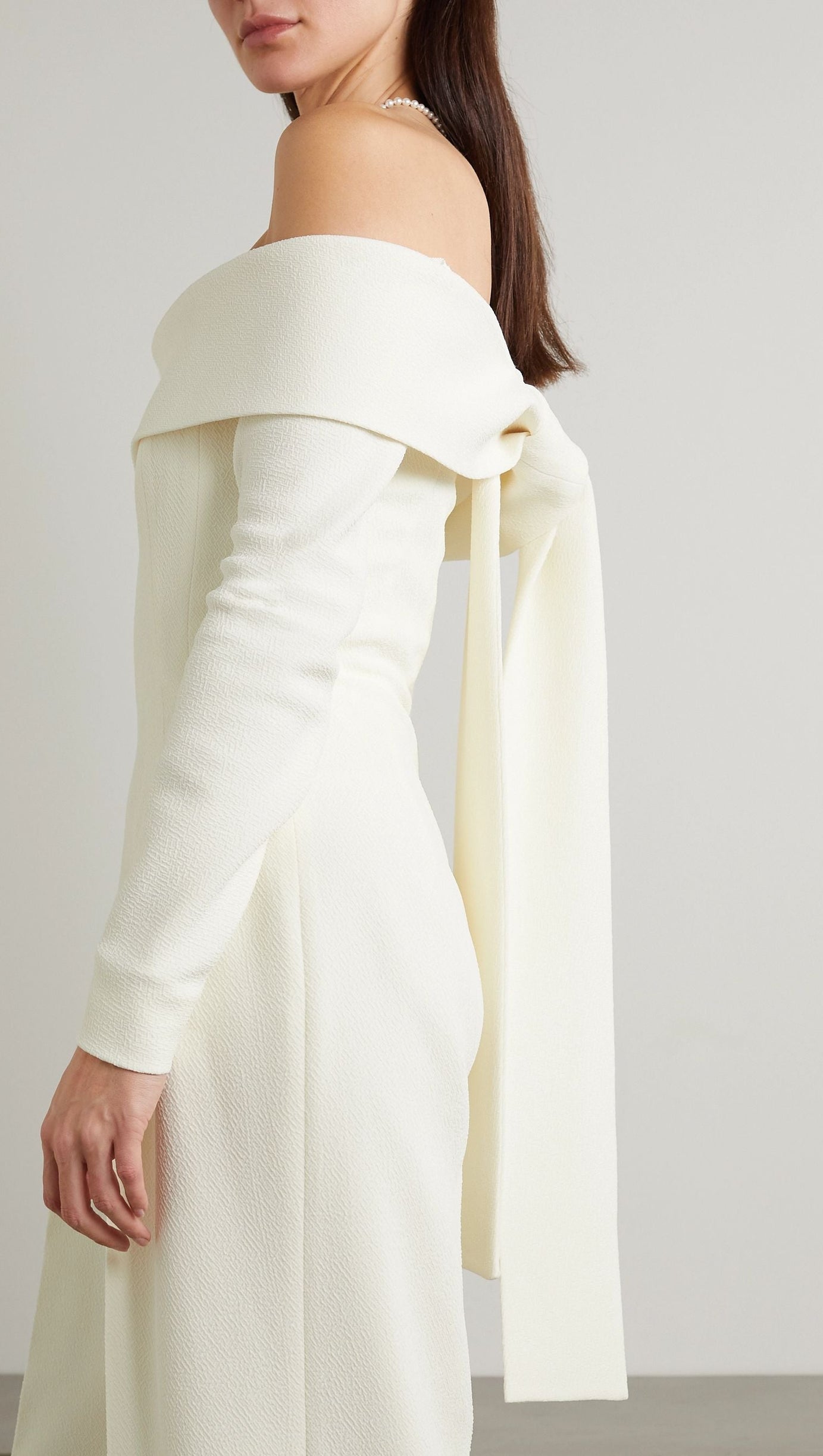 VESPER OFF-THE-SHOULDER CREPE JUMPSUIT IN IVORY